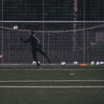 photograph of a goalkeeper playing football